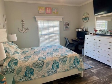 Welcome home to this impeccable 2-bedroom 2-bath sanctuary on Cypresswood Golf and Country Club in Florida - for sale on GolfHomes.com, golf home, golf lot