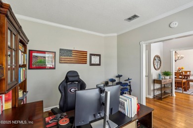 Welcome to your dream home in the prestigious gated community of on Cimarrone Golf and Country Club in Florida - for sale on GolfHomes.com, golf home, golf lot