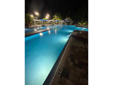 Sought after 4th floor Grantham A. Steps from pool. Beautiful on Hillsboro Pines Golf in Florida - for sale on GolfHomes.com, golf home, golf lot