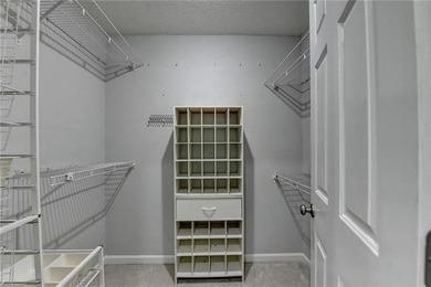 Nestled along the 5th fairway, this beautifully positioned home on Country Club of Roswell in Georgia - for sale on GolfHomes.com, golf home, golf lot