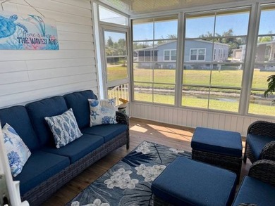 Welcome home to this impeccable 2-bedroom 2-bath sanctuary on Cypresswood Golf and Country Club in Florida - for sale on GolfHomes.com, golf home, golf lot