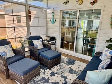 Welcome home to this impeccable 2-bedroom 2-bath sanctuary on Cypresswood Golf and Country Club in Florida - for sale on GolfHomes.com, golf home, golf lot