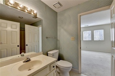 Nestled along the 5th fairway, this beautifully positioned home on Country Club of Roswell in Georgia - for sale on GolfHomes.com, golf home, golf lot