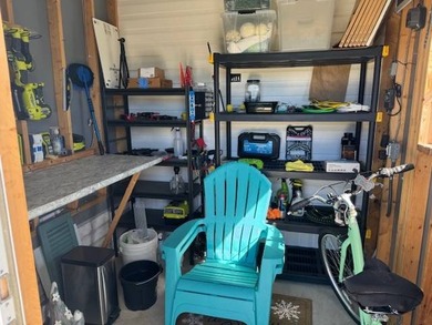 Welcome home to this impeccable 2-bedroom 2-bath sanctuary on Cypresswood Golf and Country Club in Florida - for sale on GolfHomes.com, golf home, golf lot