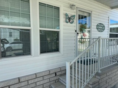 Welcome home to this impeccable 2-bedroom 2-bath sanctuary on Cypresswood Golf and Country Club in Florida - for sale on GolfHomes.com, golf home, golf lot