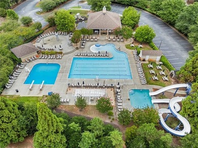 Nestled along the 5th fairway, this beautifully positioned home on Country Club of Roswell in Georgia - for sale on GolfHomes.com, golf home, golf lot