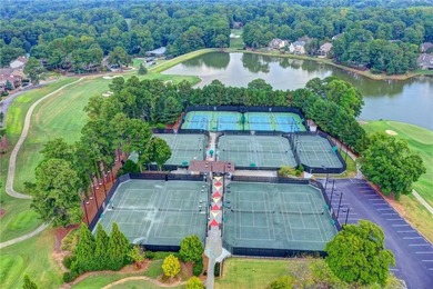 Nestled along the 5th fairway, this beautifully positioned home on Country Club of Roswell in Georgia - for sale on GolfHomes.com, golf home, golf lot