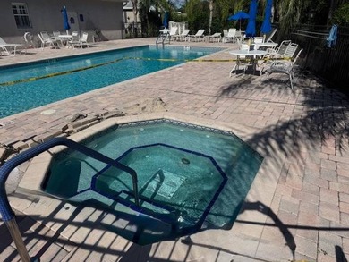 Welcome home to this impeccable 2-bedroom 2-bath sanctuary on Cypresswood Golf and Country Club in Florida - for sale on GolfHomes.com, golf home, golf lot