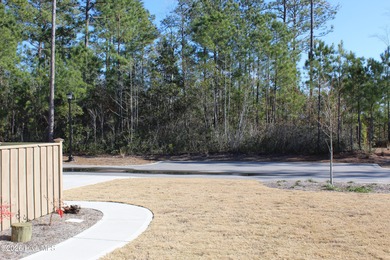 Enjoy easy, single-level, maintenance-free living in this on Cape Fear National At Brunswick Forest in North Carolina - for sale on GolfHomes.com, golf home, golf lot