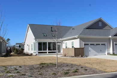 Enjoy easy, single-level, maintenance-free living in this on Cape Fear National At Brunswick Forest in North Carolina - for sale on GolfHomes.com, golf home, golf lot