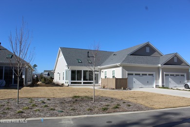 Enjoy easy, single-level, maintenance-free living in this on Cape Fear National At Brunswick Forest in North Carolina - for sale on GolfHomes.com, golf home, golf lot