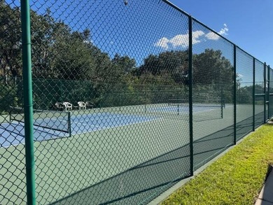 Welcome home to this impeccable 2-bedroom 2-bath sanctuary on Cypresswood Golf and Country Club in Florida - for sale on GolfHomes.com, golf home, golf lot