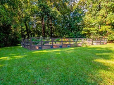 Nestled along the 5th fairway, this beautifully positioned home on Country Club of Roswell in Georgia - for sale on GolfHomes.com, golf home, golf lot