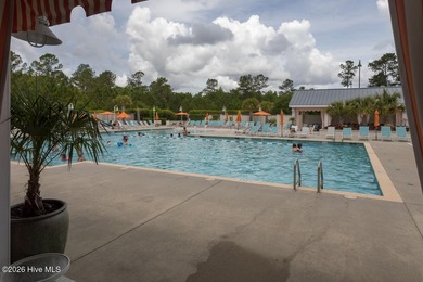 Enjoy easy, single-level, maintenance-free living in this on Cape Fear National At Brunswick Forest in North Carolina - for sale on GolfHomes.com, golf home, golf lot