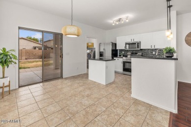 Welcome home to this delightful 3-bedroom, 2-bathroom bungalow on The Golf Club At Johnson Ranch in Arizona - for sale on GolfHomes.com, golf home, golf lot