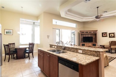 This spacious Courtyard Home is located in the exclusive Gated on Spanish Wells Golf and Country Club in Florida - for sale on GolfHomes.com, golf home, golf lot