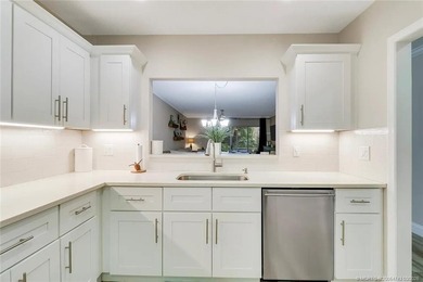 Light, bright, and perfectly located! This beautifully updated on Martin County Golf Course in Florida - for sale on GolfHomes.com, golf home, golf lot