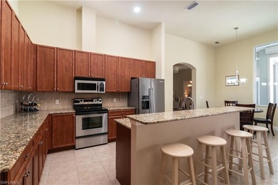 This spacious Courtyard Home is located in the exclusive Gated on Spanish Wells Golf and Country Club in Florida - for sale on GolfHomes.com, golf home, golf lot