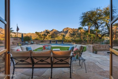 Luxurious Home with Breathtaking Views is nestled in a large on Oro Valley Country Club in Arizona - for sale on GolfHomes.com, golf home, golf lot