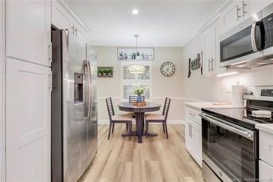 Light, bright, and perfectly located! This beautifully updated on Martin County Golf Course in Florida - for sale on GolfHomes.com, golf home, golf lot