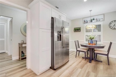 Light, bright, and perfectly located! This beautifully updated on Martin County Golf Course in Florida - for sale on GolfHomes.com, golf home, golf lot