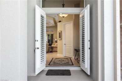 This spacious Courtyard Home is located in the exclusive Gated on Spanish Wells Golf and Country Club in Florida - for sale on GolfHomes.com, golf home, golf lot