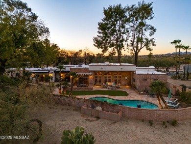 Luxurious Home with Breathtaking Views is nestled in a large on Oro Valley Country Club in Arizona - for sale on GolfHomes.com, golf home, golf lot