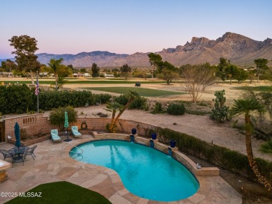 Luxurious Home with Breathtaking Views is nestled in a large on Oro Valley Country Club in Arizona - for sale on GolfHomes.com, golf home, golf lot