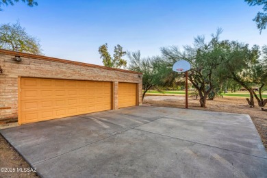 Luxurious Home with Breathtaking Views is nestled in a large on Oro Valley Country Club in Arizona - for sale on GolfHomes.com, golf home, golf lot