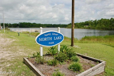 Take a look at this .24-acre wooded lot in the community of on The Lakes Country Club in North Carolina - for sale on GolfHomes.com, golf home, golf lot