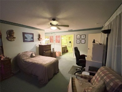 Located on a cul-de-sac, this 2 bedroom home overlooks a on Cypresswood Golf and Country Club in Florida - for sale on GolfHomes.com, golf home, golf lot