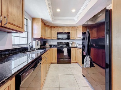 Welcome to this charming 2-bedroom, 2-bathroom condo in the on Feather Sound Country Club in Florida - for sale on GolfHomes.com, golf home, golf lot