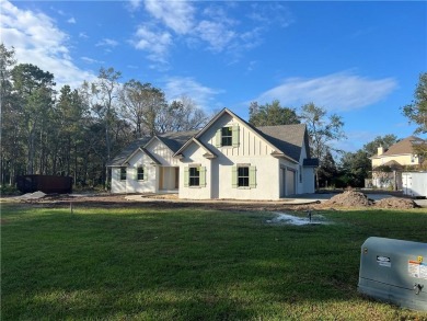 HOME IS UNDER CONSTRUCTION. SET TO BE FINISHED IN DECEMBER OF on Oak Grove Island Golf and Country Club in Georgia - for sale on GolfHomes.com, golf home, golf lot