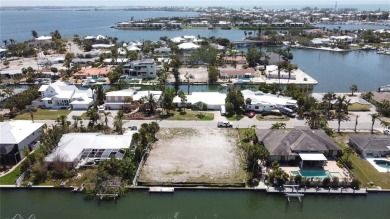 Here is your perfect chance to build your dream waterfront home on Key Royale Club in Florida - for sale on GolfHomes.com, golf home, golf lot