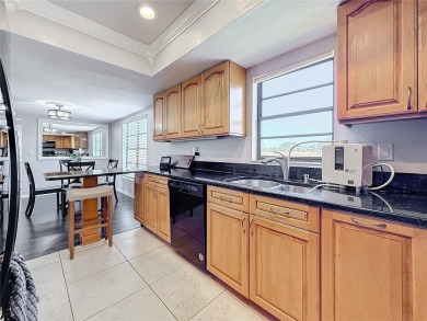 Welcome to this charming 2-bedroom, 2-bathroom condo in the on Feather Sound Country Club in Florida - for sale on GolfHomes.com, golf home, golf lot