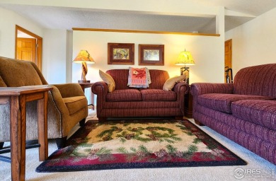 Walk into fantastic! This is a prime location for all things on Estes Park Golf Course in Colorado - for sale on GolfHomes.com, golf home, golf lot