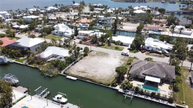 Here is your perfect chance to build your dream waterfront home on Key Royale Club in Florida - for sale on GolfHomes.com, golf home, golf lot