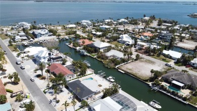Here is your perfect chance to build your dream waterfront home on Key Royale Club in Florida - for sale on GolfHomes.com, golf home, golf lot