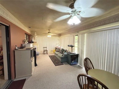 Located on a cul-de-sac, this 2 bedroom home overlooks a on Cypresswood Golf and Country Club in Florida - for sale on GolfHomes.com, golf home, golf lot