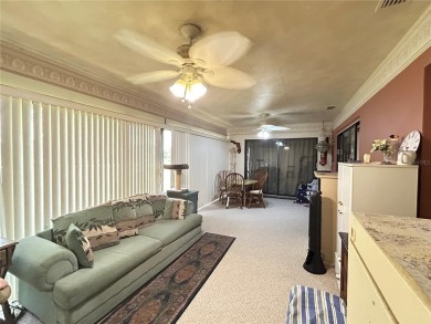 Located on a cul-de-sac, this 2 bedroom home overlooks a on Cypresswood Golf and Country Club in Florida - for sale on GolfHomes.com, golf home, golf lot