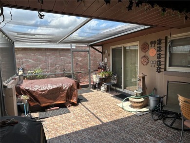 Located on a cul-de-sac, this 2 bedroom home overlooks a on Cypresswood Golf and Country Club in Florida - for sale on GolfHomes.com, golf home, golf lot