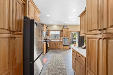 Welcome to this beautifully maintained one level home, nestled on Chewelah Golf and Country Club  in Washington - for sale on GolfHomes.com, golf home, golf lot
