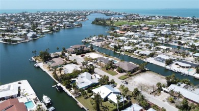 Here is your perfect chance to build your dream waterfront home on Key Royale Club in Florida - for sale on GolfHomes.com, golf home, golf lot