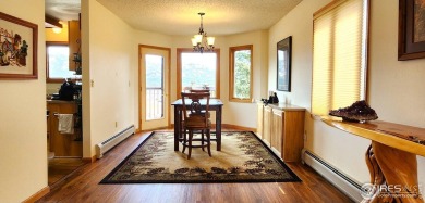 Walk into fantastic! This is a prime location for all things on Estes Park Golf Course in Colorado - for sale on GolfHomes.com, golf home, golf lot