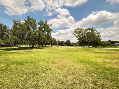 Located on a cul-de-sac, this 2 bedroom home overlooks a on Cypresswood Golf and Country Club in Florida - for sale on GolfHomes.com, golf home, golf lot