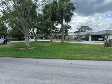 Located on a cul-de-sac, this 2 bedroom home overlooks a on Cypresswood Golf and Country Club in Florida - for sale on GolfHomes.com, golf home, golf lot