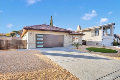 Welcome to this delightful 4-bedroom, 2-bathroom home located in on Spring Valley Lake Country Club in California - for sale on GolfHomes.com, golf home, golf lot