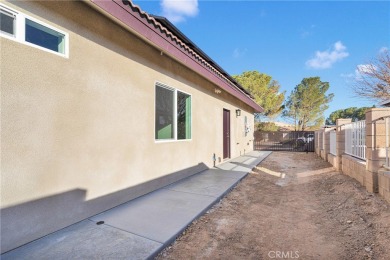 Welcome to this delightful 4-bedroom, 2-bathroom home located in on Spring Valley Lake Country Club in California - for sale on GolfHomes.com, golf home, golf lot