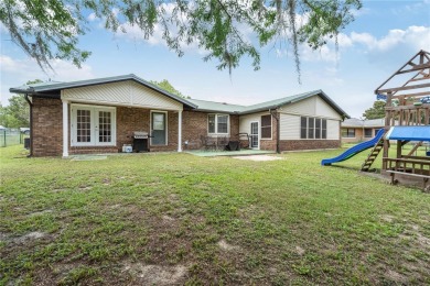 Welcome to this lovely, well-maintained 3-bedroom, 2-bath home on Williston Highlands Golf and Country Club in Florida - for sale on GolfHomes.com, golf home, golf lot