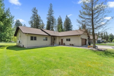 Welcome to this beautifully maintained one level home, nestled on Chewelah Golf and Country Club  in Washington - for sale on GolfHomes.com, golf home, golf lot
